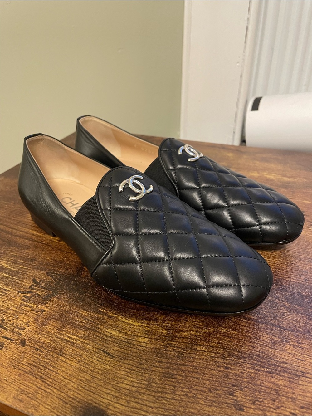 CHANEL Black Quilted Leather Slip-On Loafers with Gold Hardware